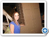 Jennifer on the second level of the Eiffel Tower at night.