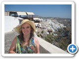 Jennifer posing with the town of Fira in the background.